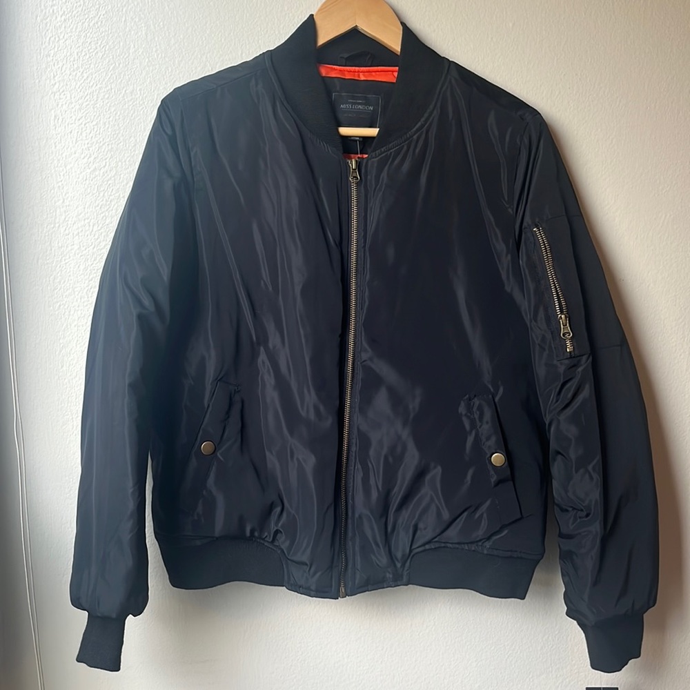 Bomber jacket with orange lining